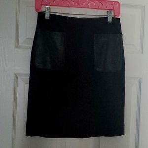 Black skirt with leather pockets